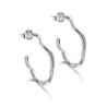 Irregular hoop earrings in sterling silver
